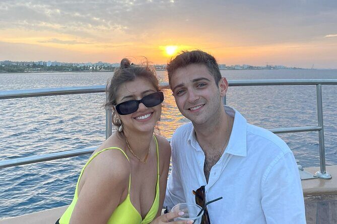 3-Hour Sunset Cruise from Protaras with Fruit & Champagne - Cyclops Cave, sea-cave passes, and the Lovers’ Bridge photo moment