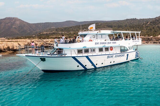 Blue Lagoon cruise: giant slide, music & Paphos hotel transfers - Drinks, fruit, and onboard food: what’s included versus what’s extra