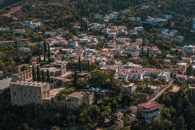 From Nicosia and Kyrenia: Famagusta & Kyrenia as Circular Tour - Salamis Ruins: Baths, Latrines, a Theatre, and a Gladiator Feeling