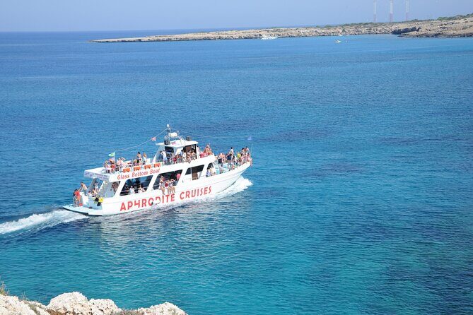 From Protaras: Turtle Cove & Blue Lagoon Cruise - The coast drive-by that turns into real context: Fig Tree Bay and Cape Greco