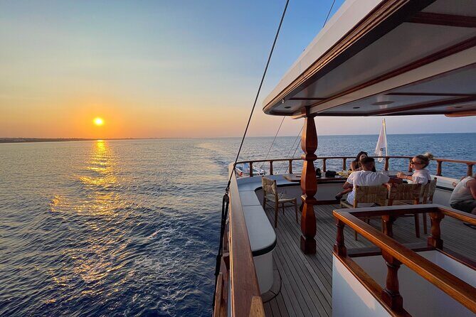 Golden Hour Sunset Cruise in Cyprus - Back on the return: sea caves, then homemade Cyprus dessert