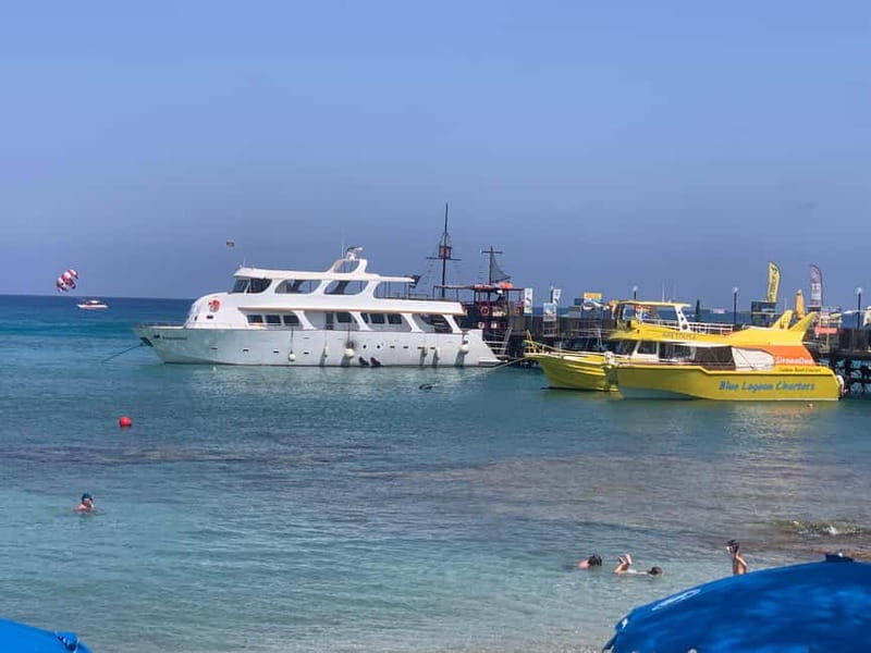 Protaras: 80s and 90s Sunset Cruise with Cypriot Dinner & DJ - The sightseeing route near Cape Greco: bridges, shrines, and famous viewpoints