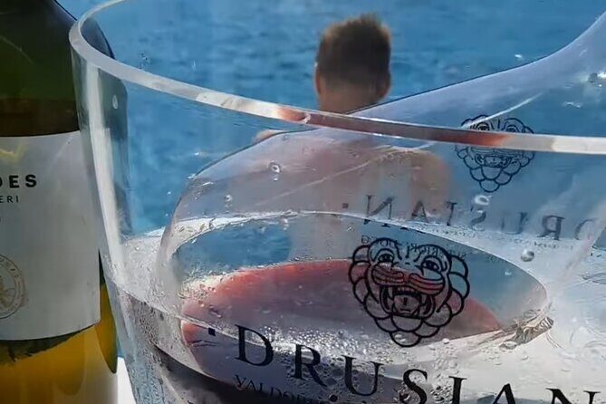 Wine tasting on-board the Demetris Chara BBQboat BlueLagoon tours - Passing Lachi Beach: the quick coastal show before the lagoon